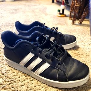 Adidas black and white low tops